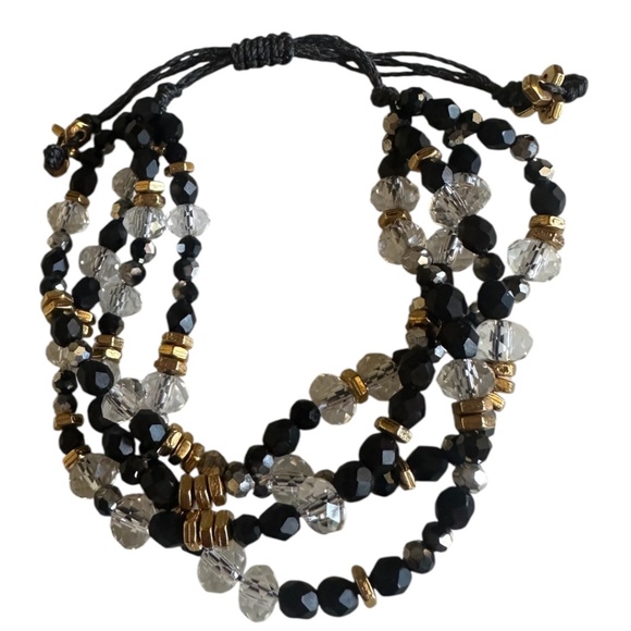 Adjustable Four Strand Bracelet in Black, Clear, Gold, and Silver - Picture 1 of 7